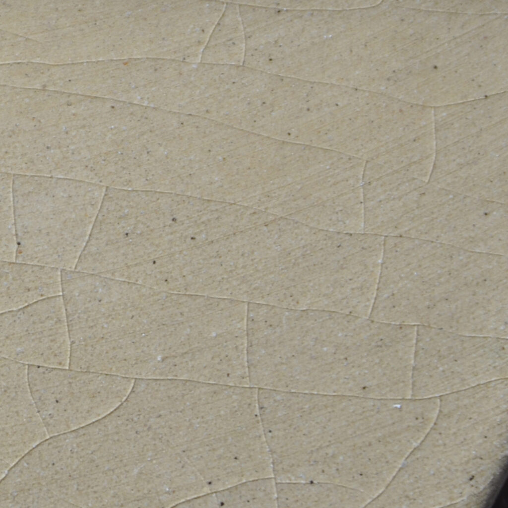 Closeup of hairline cracks in tiles