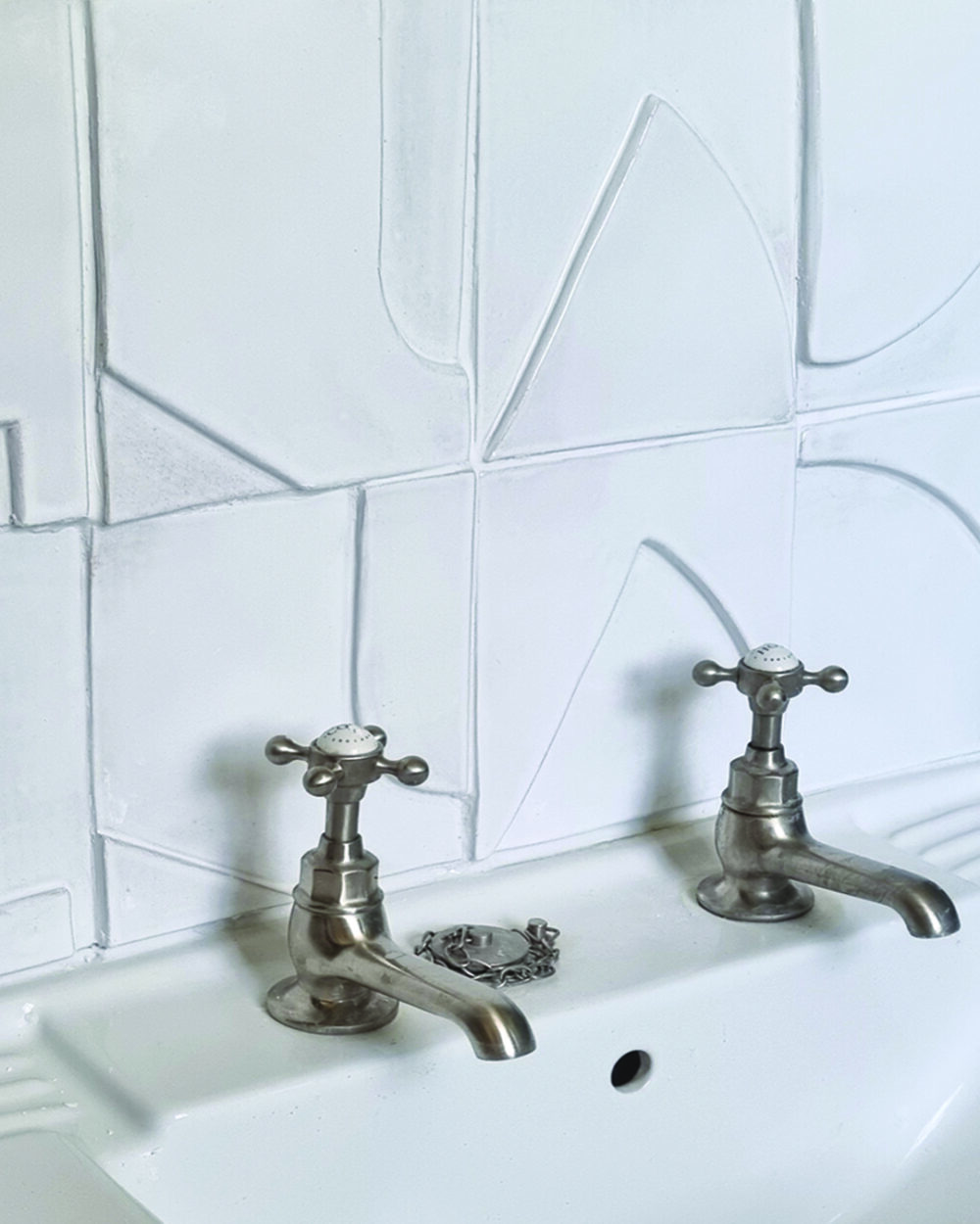 Bathroom Sink with white handmade ceramic tiles